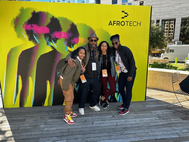 SailPoint crew members in front of AfroTech Connect conference sign